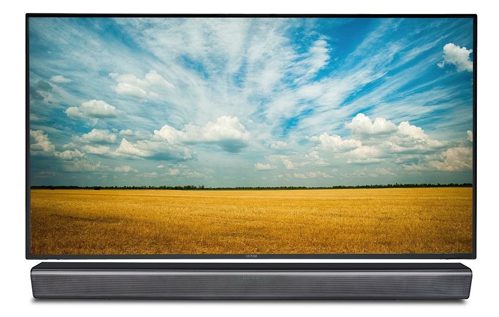 Soundbar Denver DSB-4020 čierny Zapnutá televízia s poľnou krajinou a pod ňou soundbar Denver DSB-4020