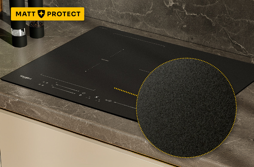 Indukčná varná doska Whirlpool WB S2560 NE BM MattProtect čierna Detail matnej indukčnej varnej deky Whirlpool v žltom koliesku