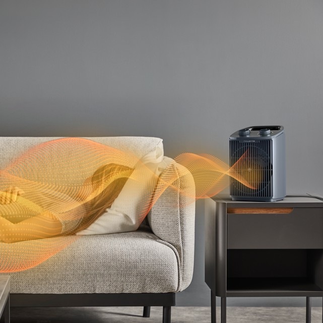 Teplovzdušný ventilátor Rowenta SO2351F0 Intense Comfort sivý Teplovzdušný ventilátor Rowenta SO2351F0 Intense Comfort v obývačke vyžaruje teplo