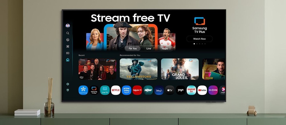 Televízor Samsung The Frame QE55LS03H televízia samsung pripevnená na stene, je na nej pustené operačný systém tizen a jeho aplikácie