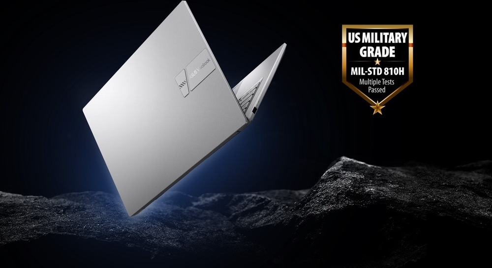 Notebook ASUS Vivobook 14 s certifikáciou odolnosti MIL-STD 810H na tmavom pozadí