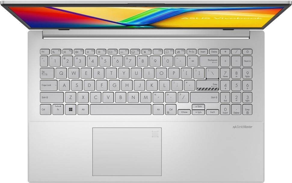 Pohľad zhora na klávesnicu a touchpad notebooku ASUS Vivobook Go 15″ width=