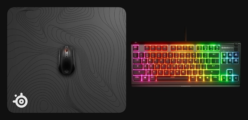 Podložka pod myš SteelSeries QcK Large, Topographic čierna Podložka QcK Large Topographic s myšou vedľa klávesnice s RGB podsvietením