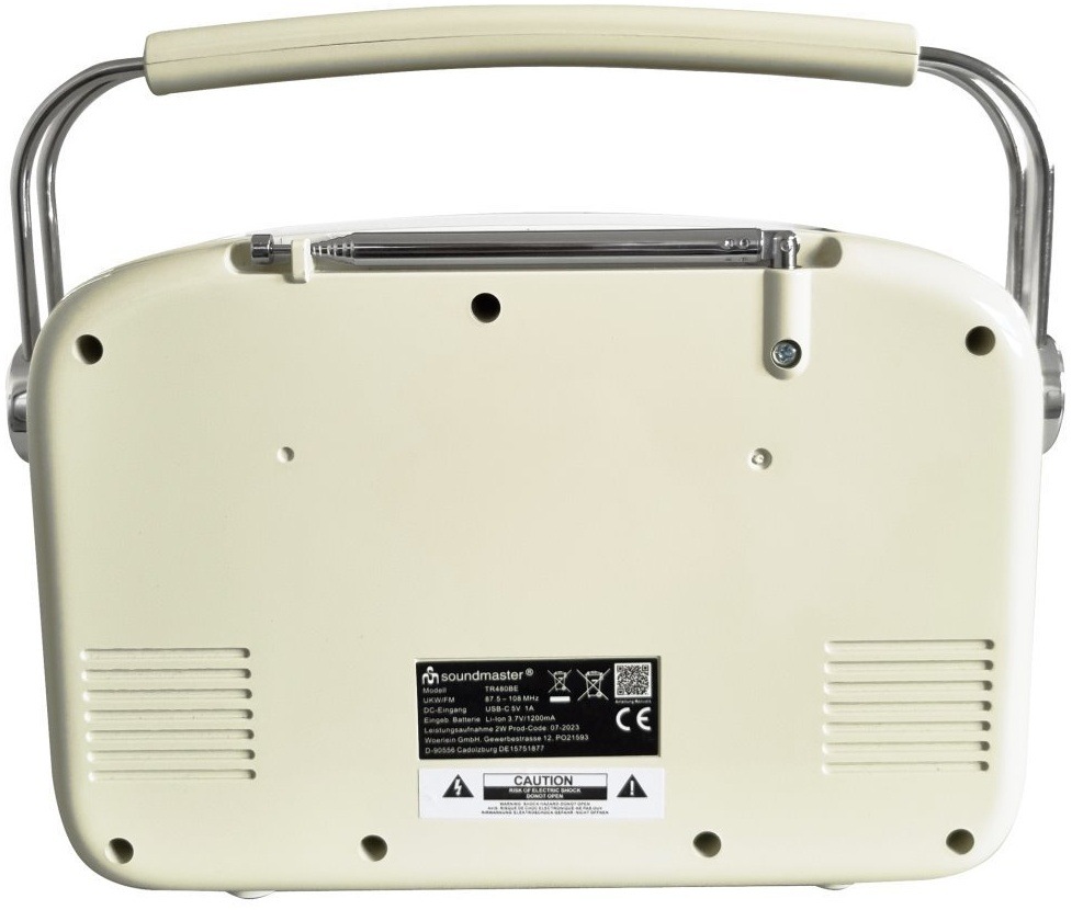 Zadná strana rádia Soundmaster TR480BE v béžovej farbe so štítkom technických parametrov a zloženou anténou.