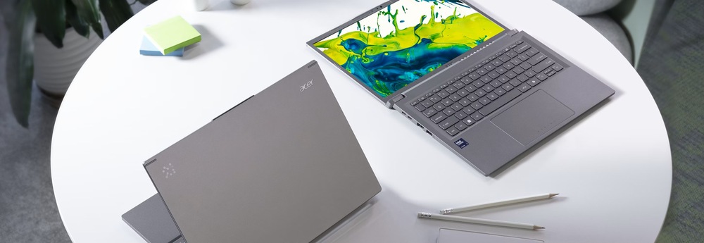 Notebook Acer Aspire 14 AI (A14-52MT-76GE) sivý Hmotnosť iba 1,4 kg a hrúbka približne 17 mm uľahčujú každodenné prenášanie notebooku.