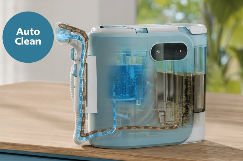 Obrázok zachytáva pohľad do vnútorného priestoru čističe Philips 3000 Series XW3193/11 a to, ako dochádza k automatickému prepláchnutiu hadice po každom použití.