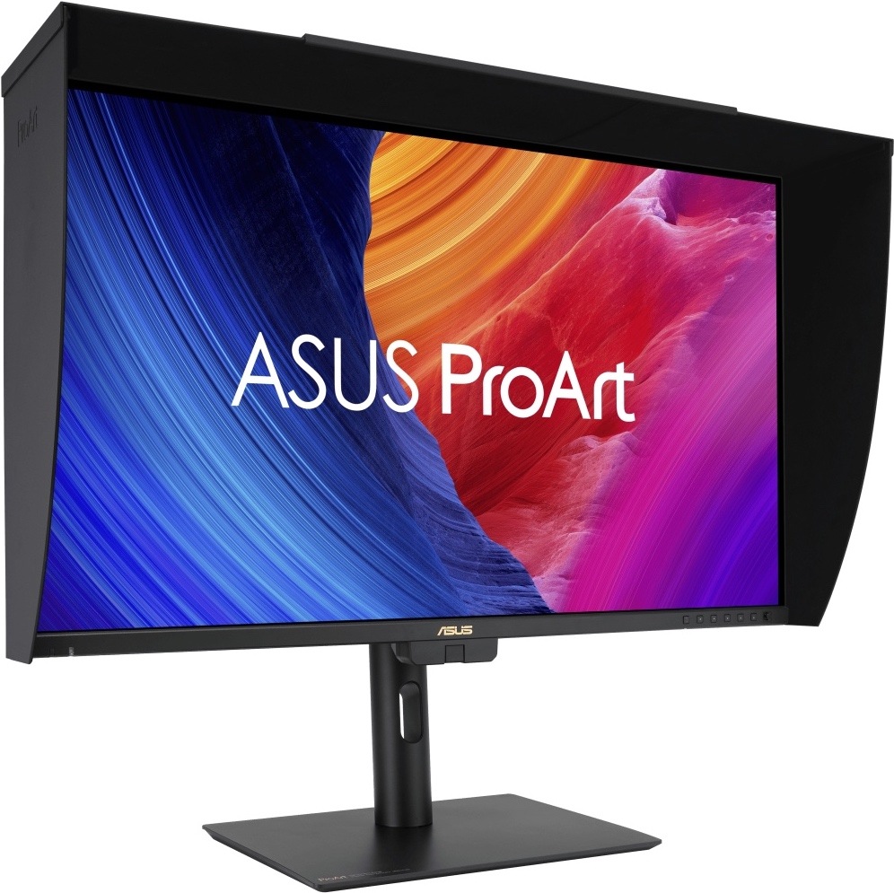 Monitor Asus ProArt PA27UCGE čierny Na obrázku je monitor Asus ProArt PA27UCGE 27" z predného šikmého pohľadu. Monitor má čiernu tieniacu clonu po hornej a bočných stranách, ktorá obmedzuje rušivé svetlo a odlesky pri práci s obrazom. Displej stojí na čiernom výškovo nastaviteľnom stojane s plochou základňou a otvorom pre vedenie. modrých, oranžových, červených a fialových odtieňoch. Vpravo dole pod displejom sú vidieť ovládacie tlačidlá monitora.