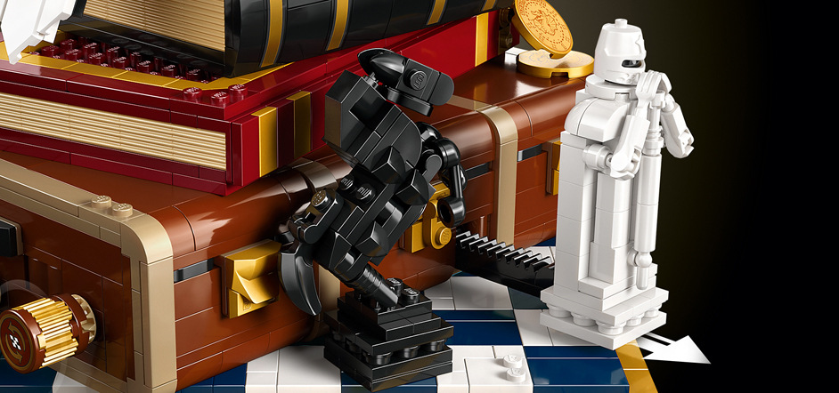 Stavebnica LEGO® Harry Potter™ 76466 Kámen mudrců – sběratelská edice Harryho kufor ukrýva tri filmové scény, ktoré môžete aktivovať pomocou otočných koliesok a objavovať skryté detaily.