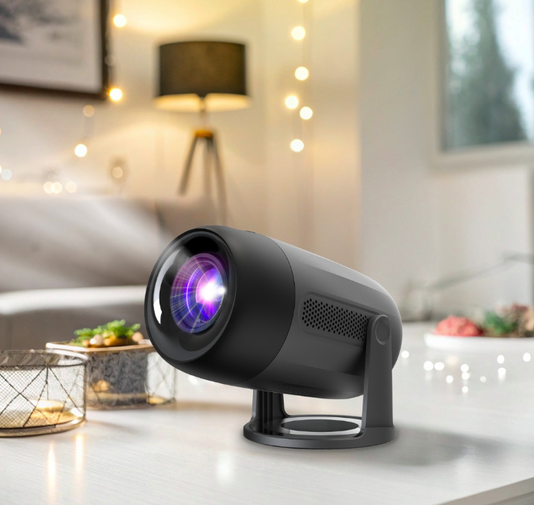 Projektor Philips NeoPix 150 LCD Full HD v čiernom prevedení umiestnený na stole v interiéri