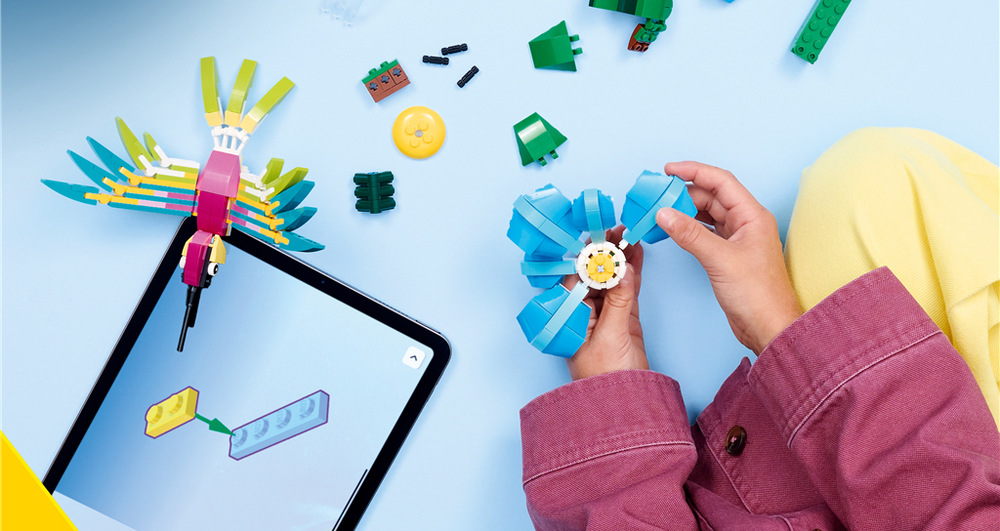 Stavebnica LEGO® Creator 3 v 1 31384 Divoká zvířata: Barevný kolibřík Kolibrík s pohyblivými časťami vytvorí farebnú prírodnú scénu, ktorú môžu deti ľubovoľne upravovať.