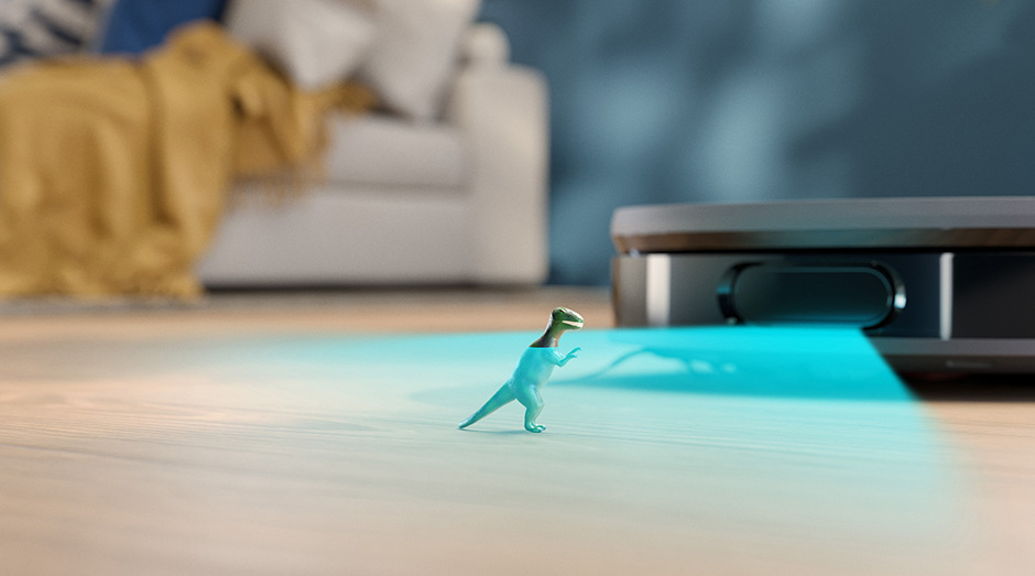 Robotický vysávač Philips XU9100/10 nerez Robotický vysávač so stanicou Philips XU9100/10 skenuje malú hračku dinosaura