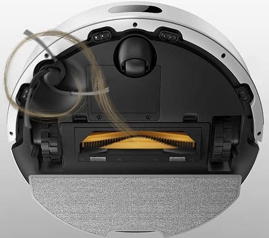 Robotický vysávač Dreame F20 Plus biely Na robotický vysávač Dreame F20 Plus sa pozeráme zospodu - zobrazenie špeciálnych zubov zabraňujúce zamotávaniu vlasov do hlavnej kefy.