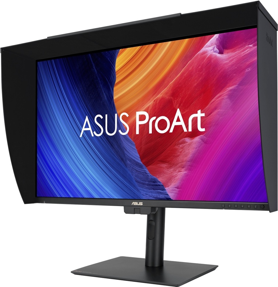 Monitor Asus ProArt PA27UCGE čierny Na obrázku je monitor Asus ProArt PA27UCGE 27" z predného šikmého pohľadu. Displej je osadený čiernou tieniacou clonou po hornej a bočných stranách, ktorá obmedzuje rušivé okolité svetlo. Monitor stojí na čiernom výškovo nastaviteľnom stojane s plochou základňou a otvorom pre vedenie káblov. oranžových, červených a fialových tónoch. Vpravo dole na spodnom rámčeku sú vidieť ovládacie tlačidlá.