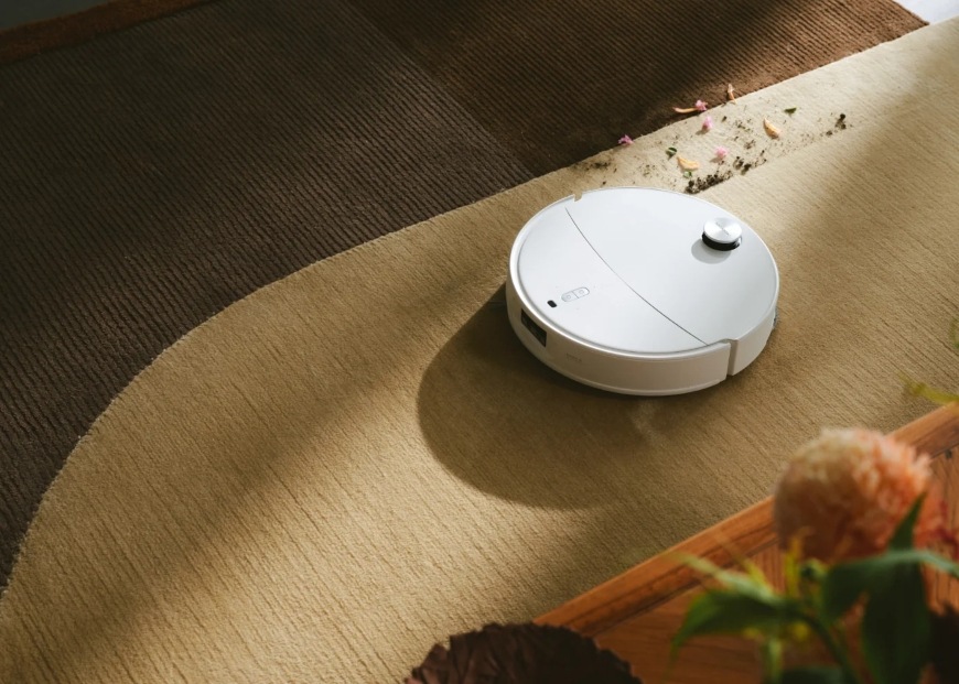 Robotický vysávač Roborock Qrevo Edge 2 Pro biely Vysypané nečistoty na koberci a silný vysávač Roborock Qrevo Edge 2 Pro