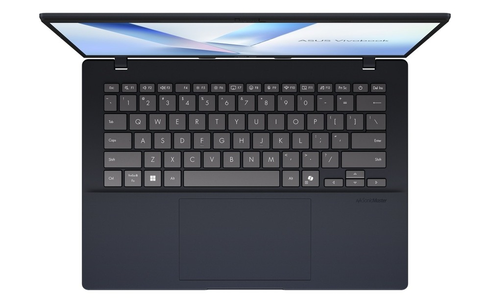 Notebook Asus Vivobook 14 čierny Pohľad zhora na klávesnici notebooku Asus Vivobook 14″ width=