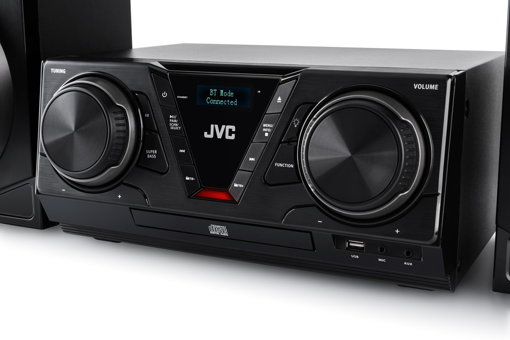 Detailný pohľad na ovládací panel minisystému JVC MX-E325B-DAB s dvoma otočnými voličmi, LCD displejom zobrazujúcim režim Bluetooth a čelnými vstupmi USB a AUX.