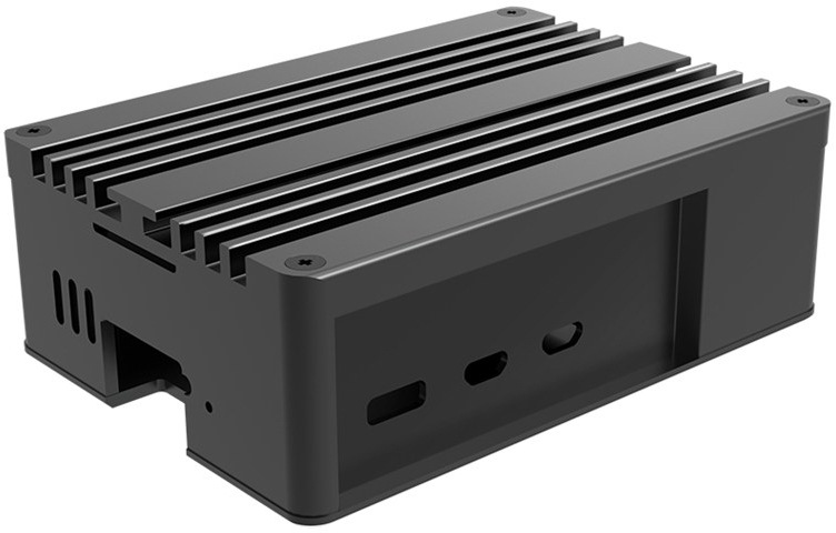 Case AKASA Pi 5 Pro Aluminium case for Raspberry Pi 5 čierna Na fotografii je čierne hliníkové puzdro AKASA Pi 5 Pro pre Raspberry Pi 5, navrhnuté ako pasívny chladič s výraznými rebrami na odvod tepla. Telo má kompaktné, hranaté prevedenie a na bočnej strane sú vidieť výrezy/otvory pre konektory a ovládacie prvky.