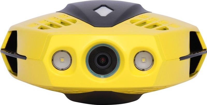 Žltý podvodný dron Chasing Dory spredu. Uprostred má kameru, po stranách dve LED svetlá a čierne otvory vrtuľou.