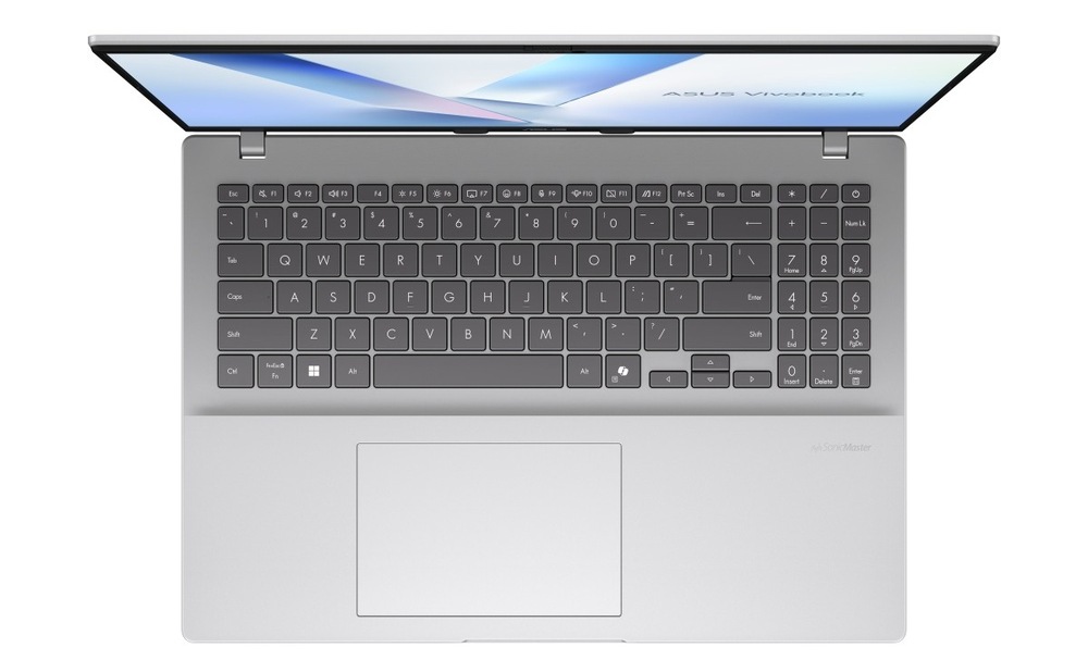 Pohľad zhora na klávesnici notebooku Asus Vivobook 16″ width=