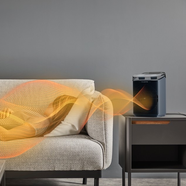 Teplovzdušný ventilátor Rowenta SO6551F0 Intense Comfort Aqua čierny Teplovzdušný ventilátor Rowenta SO6551F0 Intense Comfort Aqua v obývačke vyžaruje teplo