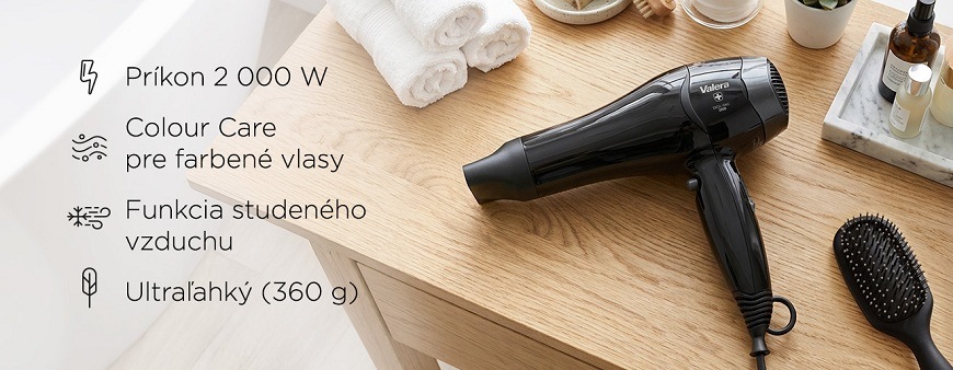 Fén Valera Excel 2000 Ionic 000092439 čierny Čierny fén Valera Excel 2000 Ionic na drevenej doske s popisom vlastností: Príkon 2000 W, Colour Care pre farbené vlasy, Funkcia studeného vzduchu, Ultraľahký (360 g).