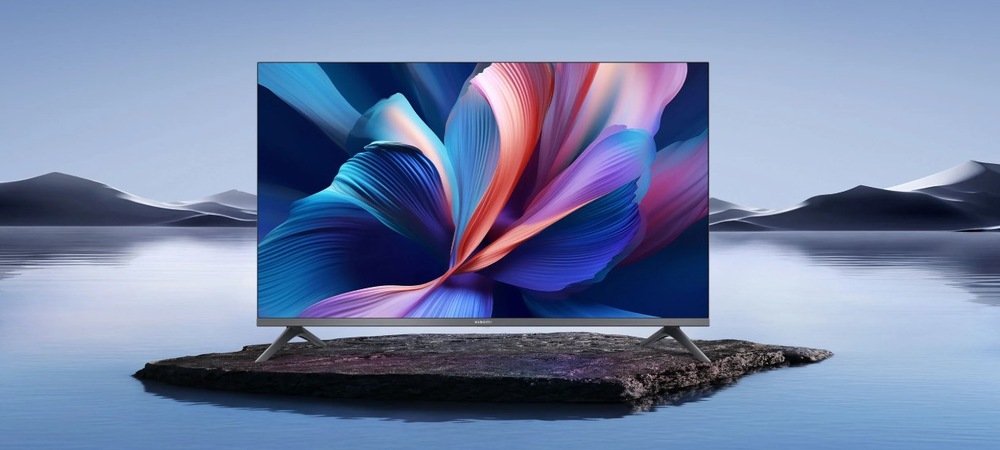 Televízor Xiaomi TV A Pro 32" Televízia Xiaomi TV A Pro 32" na kameni vo voňavosti s pozadím hôr