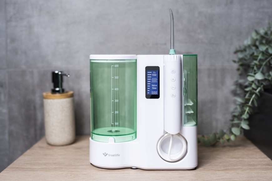 Ústna sprcha TrueLife AquaFloss Station O300 Ozone biela/zelená TrueLife AquaFloss Station O300 Ozone, bílá/zelená