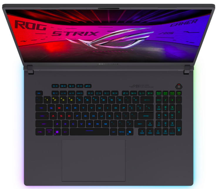 Pohľad zhora na RGB klávesnicu s numerickou časťou a veľký touchpad notebooku