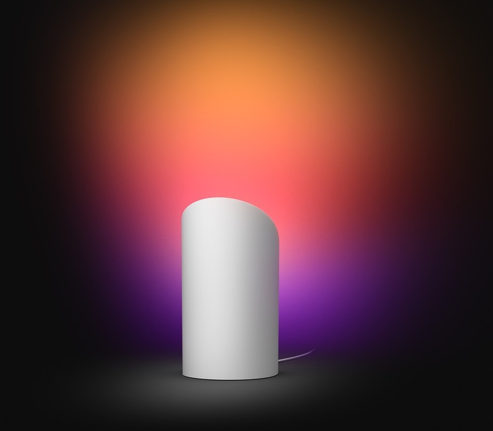 Stolové svietidlo Philips Hue Wall washer, 20W, EU/UK, White and Color Gradient biela Lampička Philips Hue Wall washer s ukážkou projekcie na stenu, vytvárajúca príjemnú atmosféru