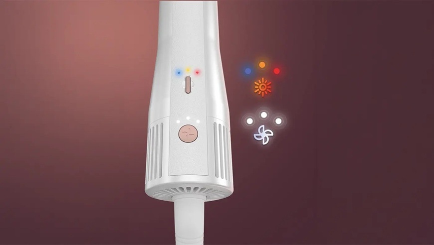 Detail rukoväte multistylera Sencor SHS 9200RS s ovládacími tlačidlami a LED indikáciou, ktorá znázorňuje nastavenie teploty a intenzity prúdenia vzduchu. Vedľa prístroja sú grafické ikony symbolizujúce rôzne režimy sušenia a stylingu.