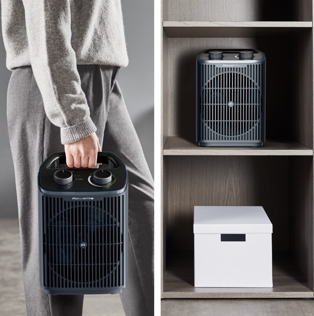 Žena prenáša teplovzdušný ventilátor Rowenta Intense Comfort Aqua do šatne na uloženie