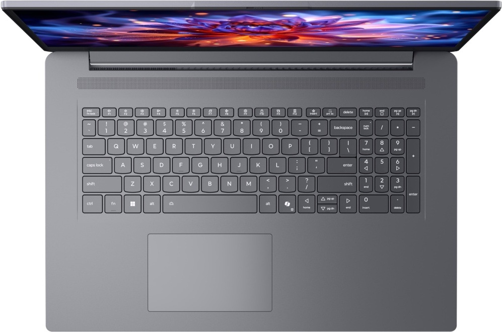 Notebook Lenovo IdeaPad Slim 3 17IWC11 sivý Pohľad zhora na notebook Lenovo s numerickou klávesnicou a priestranným touchpadom