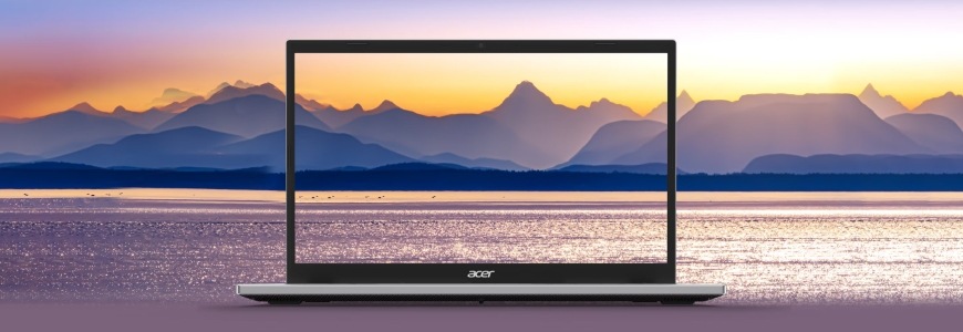 Notebook Acer Aspire Go 15 (AG15-72P-54G8) modrý Fotografie krajiny s morom a horami na pozadí aj na displeji laptopu Acer Aspire Go 15 ilustruje vysoké rozlíšenie a verné farebné podanie