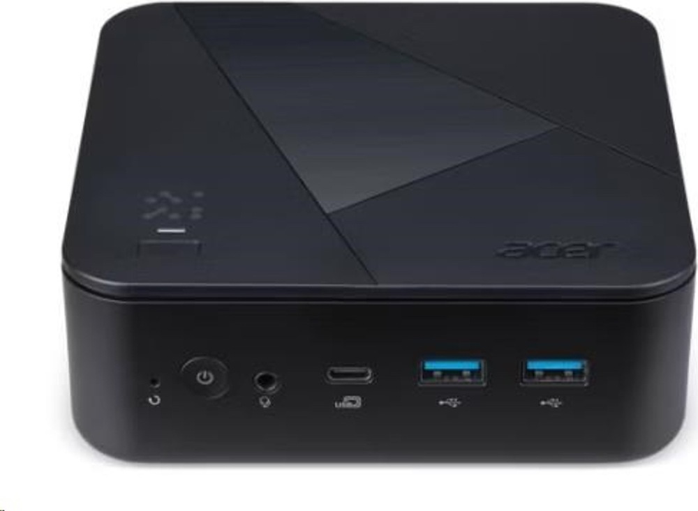 Na obrázku je detail prednej časti mini počítača Acer Revo Box RB102-BARR R5 v čiernom prevedení. Na hornej strane je decentný geometrický vzor a logo Acer. Vpredu sú dobre vidieť ovládacie prvky a konektory: tlačidlo napájania, audio konektor, USB-C a dva USB-A porty s modrým vnútrom. Zariadenie má nízke kompaktné telo so zaoblenými rohmi a pôsobí jednoducho a prakticky.