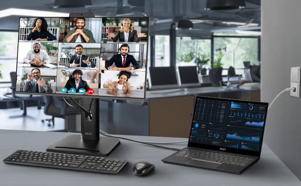 Monitor MSI PRO MP245PDG E14 čierny Monitor MSI PRO MP245PDG E14 pri videohovore a práci s notebookom