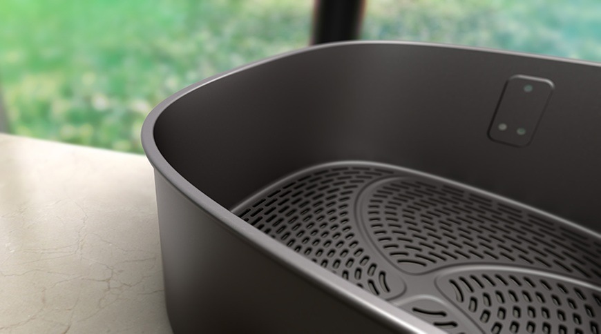 Fritéza teplovzdušná Philips Airfryer Dual Basket 4000 series 10 l, NA461/00 čierna Detailný záber na časť nepriľnavej časti pri teplovzdušnej fritéze značky Philips.