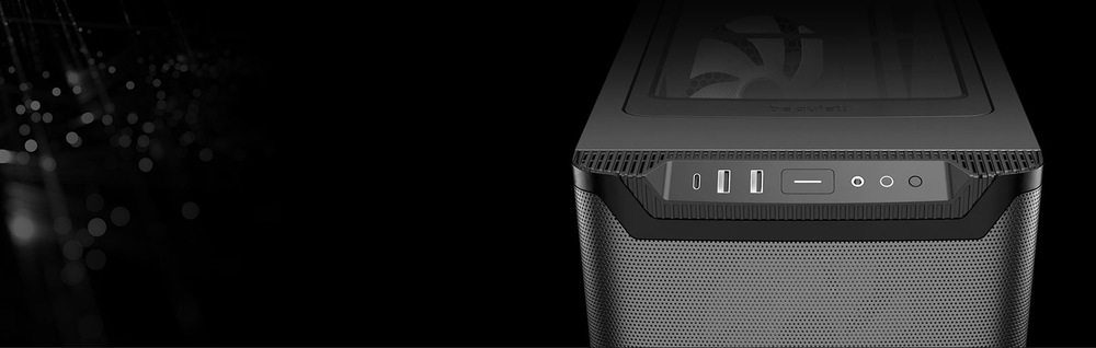 Case be quiet! PURE BASE 501LX čierna Na tmavom pozadí je zobrazená elegantná počítačová skriňa. Na jej prednom paneli sú USB porty a tlačidlá, čo naznačuje moderný hi-tech design.