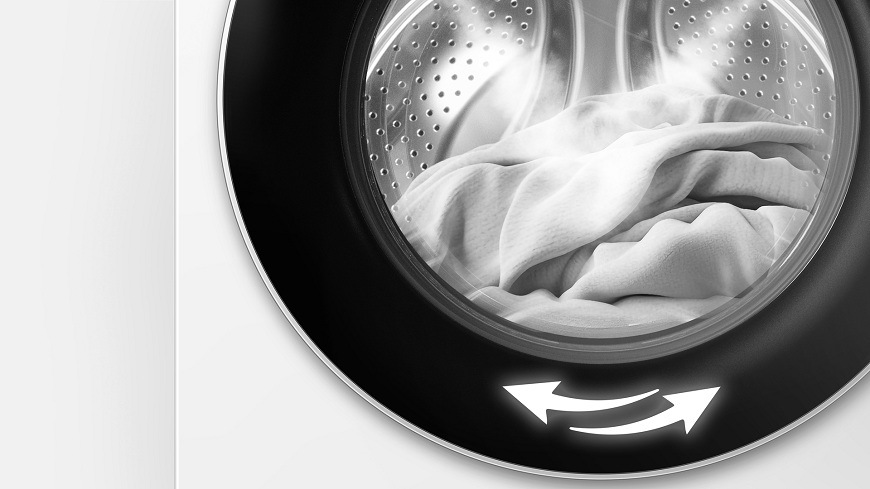Práčka Hisense WF3I6027BWU biela bubon Práčky Hisense WF3I6027BWU, v ktorom sa pretáča biela látka