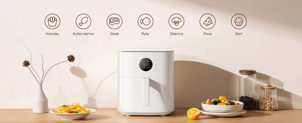 Fritéza teplovzdušná Xiaomi Air Fryer 6,5 l White MAF-W6501 biela Lifestylová fotografia produktu spolu s piktogramami zobrazujúcimi pokrmy, pre ktoré je produkt vhodný