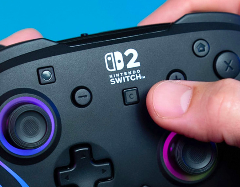 Gamepad Turtle Beach Afterglow Wave Wireless RGB, NS2 čierny Hráč stláča tlačidlo C pre otvorenie funkcií GameChat na Nintendo Switch 2″ width=