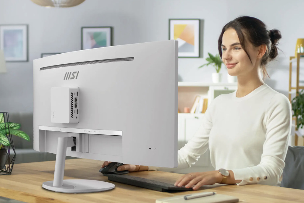 Zadná strana monitora MSI PRO MP341CQW E12 s pripevneným mini PC a stojanom