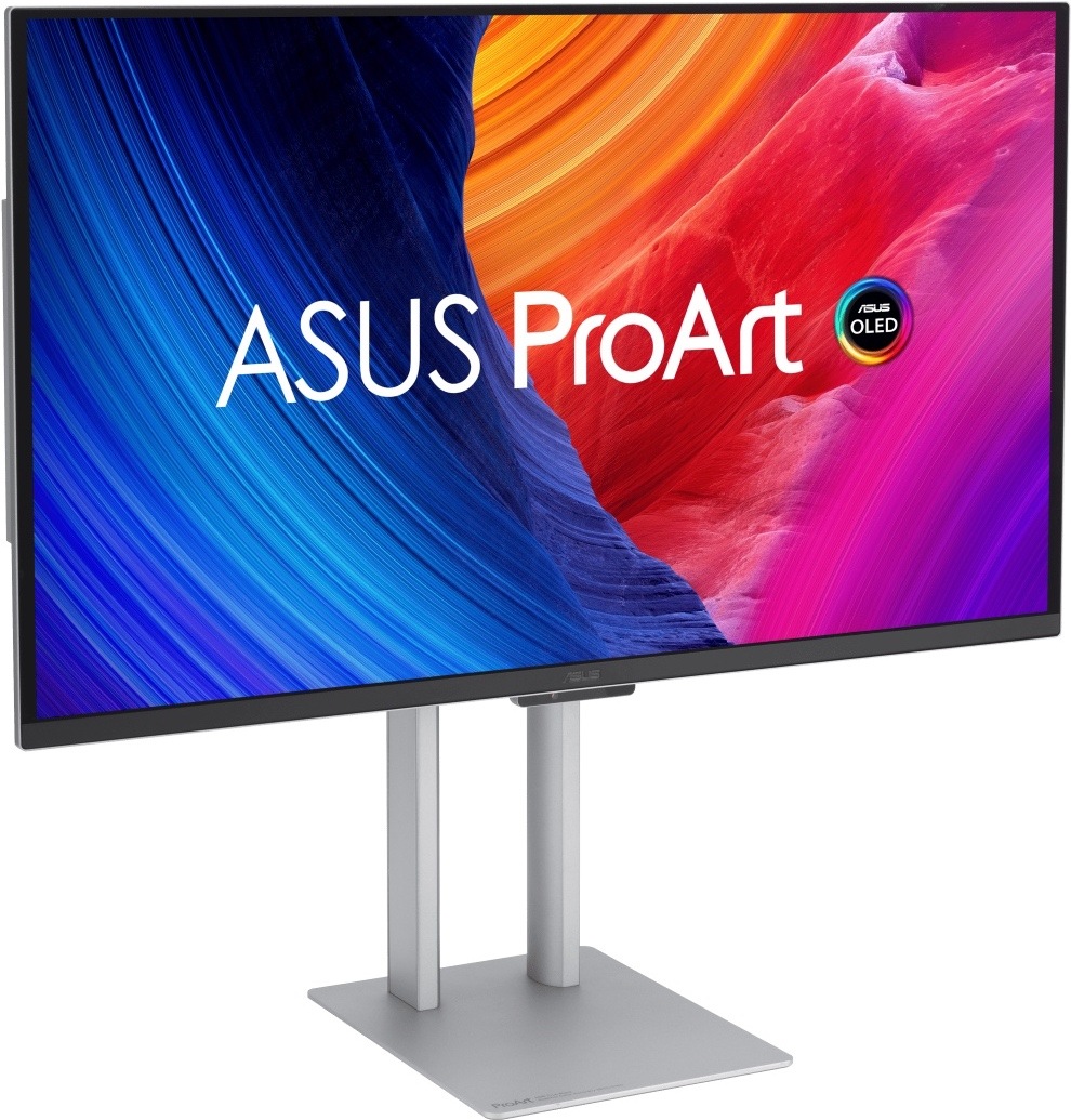 Na obrázku je monitor Asus ProArt OLED PA27UCDMR 27" z predného šikmého pohľadu. Má tenký čierny rámček a strieborný výškovo nastaviteľný stojan s plochou hranatou základňou. Na obrazovke je výrazná farebná grafika s nápisom ASUS ProArt a logom OLED, kombinujúce modré, oranžové, kombinujúce modré, oranžové. pre prácu s grafikou, fotografiami a videom.
