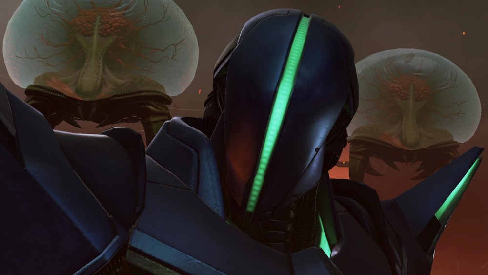 Záber z hry Metroid Prime 4: Beyond. V popredí je futuristická robotická postava so žiariacim zeleným hľadím, po stranách ju obklopujú tri veľké, vznášajúce sa medúzovité bytosti v temnom, ponurom prostredí.