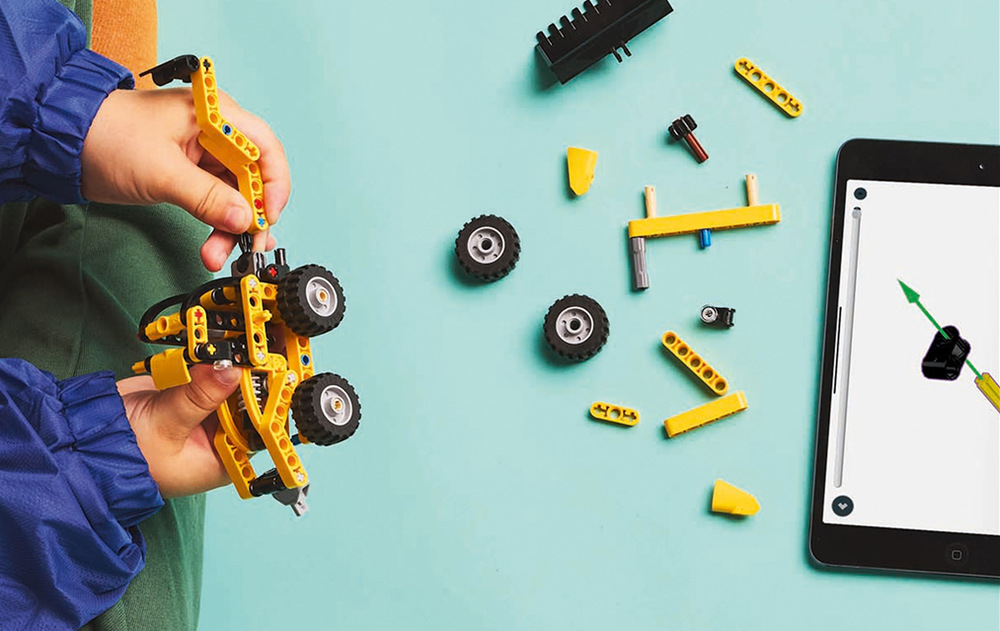 Stavebnica LEGO® Technic 42197 Zadní nakladač Kompaktný nakladač sa ľahko zmestí do detskej izby a poteší malých fanúšikov bagrov a stavebnej techniky.