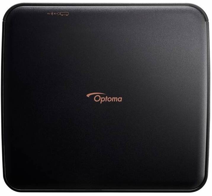Projektor Optoma Photon Life PK32 čierny Horný pohľad na matne čierne telo projektora Optoma PK32 s čistým minimalistickým dizajnom a odolným povrchom vhodným na prenášanie