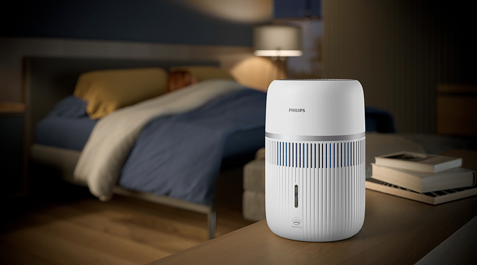 Zvlhčovač vzduchu Philips 4000 Series HU4210/04 biely Moderná spálňa so zvlhčovačom vzduchu Philips HU4210/04 4000 Series v režime spánku.