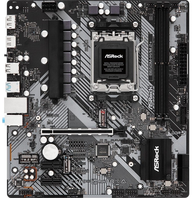 Hore je pätica AMD AM5 pre procesor, vedľa nej dva dlhé sloty DDR5. Dole je jeden dlhý PCIe x16 pre grafiku a dva krátke PCIe x1. Uprostred sú dve pozície M.2 pre SSD, na boku štyri SATA konektory. Na okrajoch sú napájacie konektory, konektory pre ventilátory a blok zadných portov (USB, LAN, HDMI/DP).