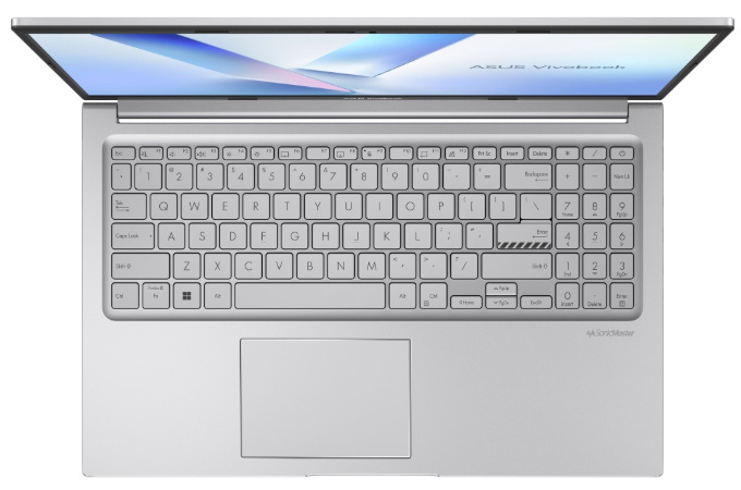 Notebook Asus Vivobook 15 strieborný Pohľad zhora na klávesnicu s numerickým blokom a touchpad notebooku ASUS Vivobook 15″ width=