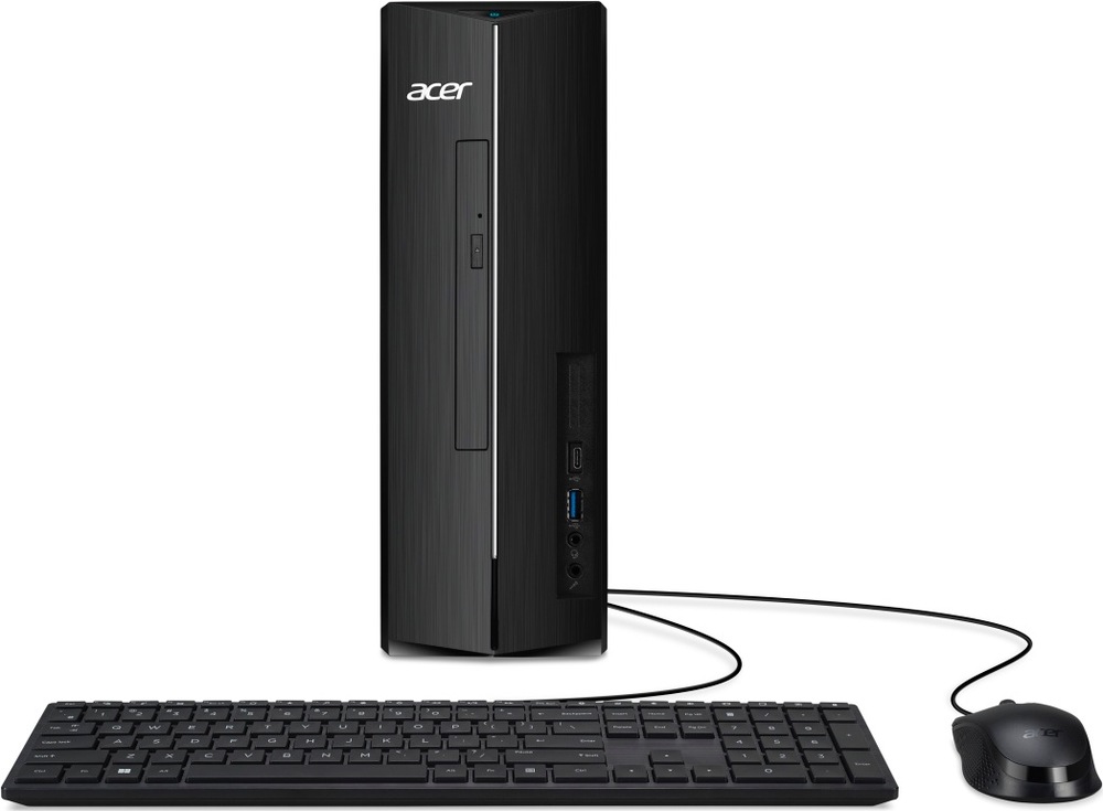Stolný počítač Acer Aspire XC-1715 čierny Na obrázku je stolný počítač Acer Aspire XC-1715 v čiernom prevedení spoločne s drôtovou klávesnicou a myšou. Úzka zvislá skriňa má na prednej strane logo Acer, optickú mechaniku, USB porty a audio konektory. Pred počítačom je plnohodnotná klávesnica s numerickou časťou a vpravo kompaktná čierna myš. Obrázok znázorňuje kompletnú základnú počítačovú zostavu.