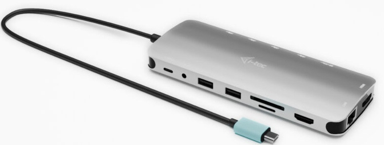 Dokovacia stanica i-tec USB-C Metal Nano 3x Display, 2x HDMI 1x USB-C video, PD 140W + Universal Charger 140 W strieborná farba Strieborná dokovacia stanica i‑tec s integrovaným USB‑C káblom a radom konektorov po stranách.
